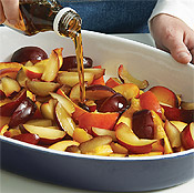 Gently toss the peaches and plums with syrup. Add the berries after baking so they don't break down too much.