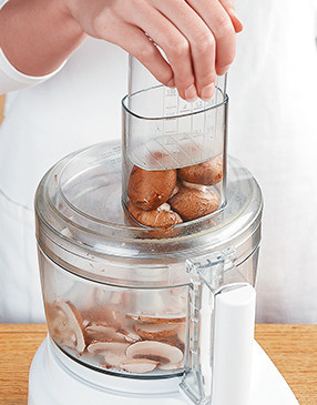 Quickly slice mushrooms by running them through a food processor fitted with the thinnest slicing blade.