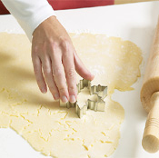 Cut shapes from rolled dough, then transfer to baking sheets. Work quickly so dough doesn&#x27;t soften too much.