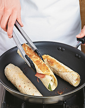 Use the leftover marinade in place of oil or butter to brown the outside of the wraps in a nonstick skillet.