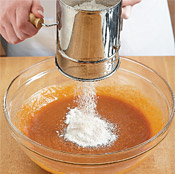 After sifting, whisk the dry mixture into wet ingredients until combined.