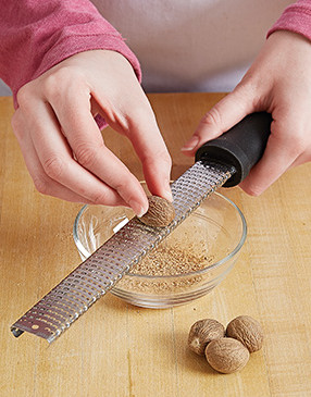 Freshly grated nutmeg has stronger flavor than ground. Run the seed against a Microplane or a grater.