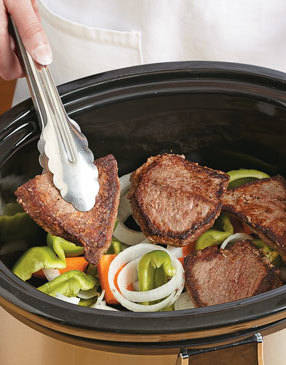 To prevent overcooking, lay the meat on top of the vegetables rather than directly in the liquid.