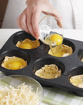 When the muffins are hot from the oven, add the eggs to the "baskets" so the eggs start cooking instantly.
