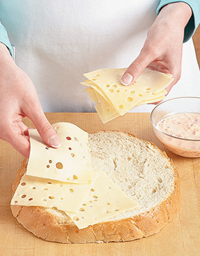 Place the cheese on the bread first, then spread the mayo on it. This way the bread won't get soggy.