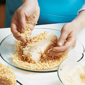 To create an even coating, crush cereal in your palm before dredging egg-dipped fillets. 