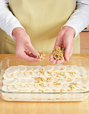 Mincing the olives makes them easier to disperse, ensuring some of their briny flavor in each bite.