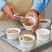 Put 3/4 cup batter in each ramekin. If using an ice cream scoop, you'll need two level scoops per ramekin. (At this point, the cakes can be chilled, then baked later.)