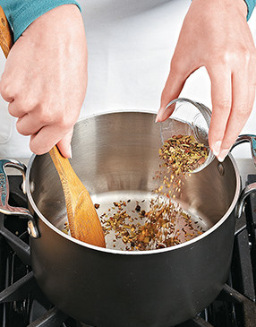 To release oils and intensify flavors, toast the spices and caraway seeds, stirring them so they don't scorch.