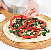 You can freeze unbaked pizza on the peel. Once the pizza is frozen, wrap it and store it in the freezer. 