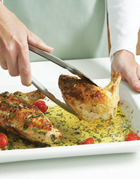 Transfer chicken from the skillet to the platter, turning it often to coat the pieces.