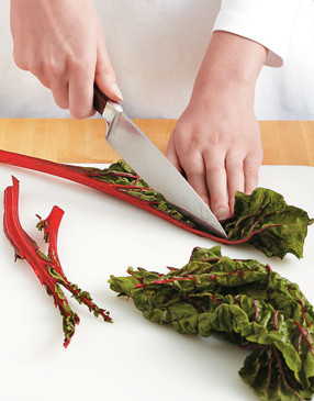Separate the thick ribs from the chard leaves. Sand gets trapped in the leaves, so rinse them well.