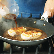 The pan should be very hot when the sauce mixture is added. The sauce will thicken as it reduces.