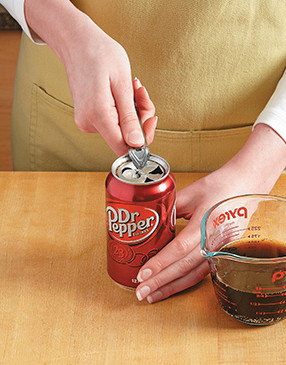 Pour out half the soda and make extra holes in the top of the can so the steam can spread evenly.