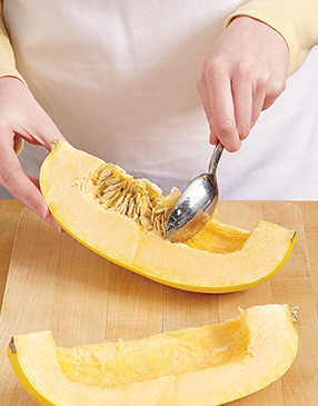 To prep the squash quarters, remove the seeds. They come out easily with a large spoon.