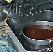 Bake the torte in a water bath inside a roasting pan to help protect its creamy, dense texture.
