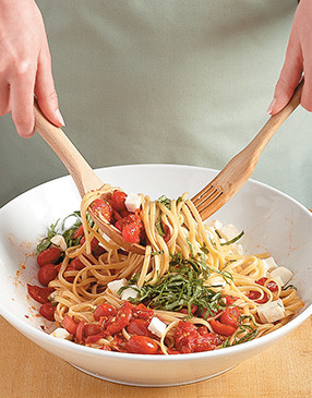 Gently toss ingredients before serving to incorporate flavors and to keep the basil fresh and colorful.