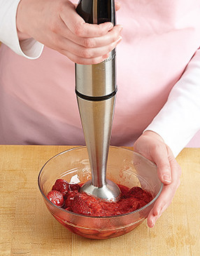 Purée roasted strawberries until smooth so they’ll distribute evenly into the ice cream base.