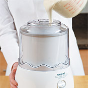 Add yogurt base to machine’s chilled canister while it’s turning to avoid freezing on the sides.