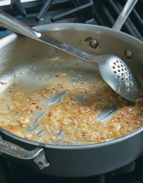 Stir the juices occasionally while they simmer so the garlic and shallots don't scorch.
