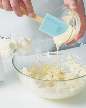 Heat white chocolate in the microwave on high in 30-second intervals, stirring often until melted.