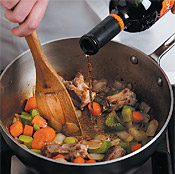 Once the bottom of the saucepan is brown, deglaze it with sherry and scrape up the flavorful bits.