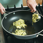 Fry cakes in oil in a nonstick skillet. Flatten the mounds into cakes using the bottom of a cup.