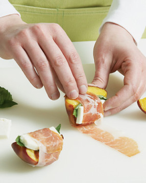 Assemble basil and cheese on nectarines, then wrap with prosciutto. (May be assembled up to 3 hours before serving.)