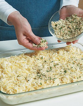 Sprinkle the bread crumb mixture on top of the penne. Bake until sauce is bubbly and topping is golden.