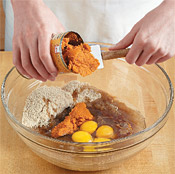 Combine the sugar, pumpkin, oil, eggs, and vanilla in a large bowl.