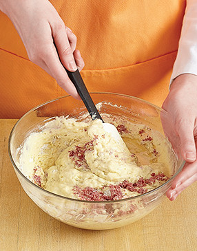 Fold corned beef into waffle batter so you don't lose the volume created by the leavener.