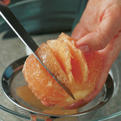Remove the segments of citrus by cutting out the wedges that lie between the membranes.