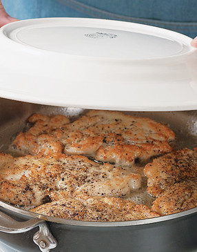 Flip cutlets over when golden brown on first side. Cover pan with a heatproof plate to keep warm.