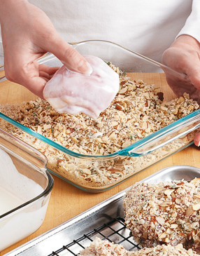 Dip chicken pieces in buttermilk, letting excess drip off. Roll pieces in crumbs to thoroughly coat.