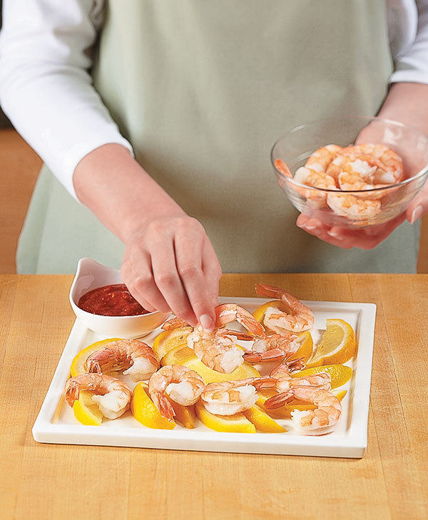 Keep Shrimp Chilled by Serving on Frozen Lemons