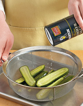 Sprinkling salt over cucumbers draws out natural liquids, allowing more pickling flavor to soak in.