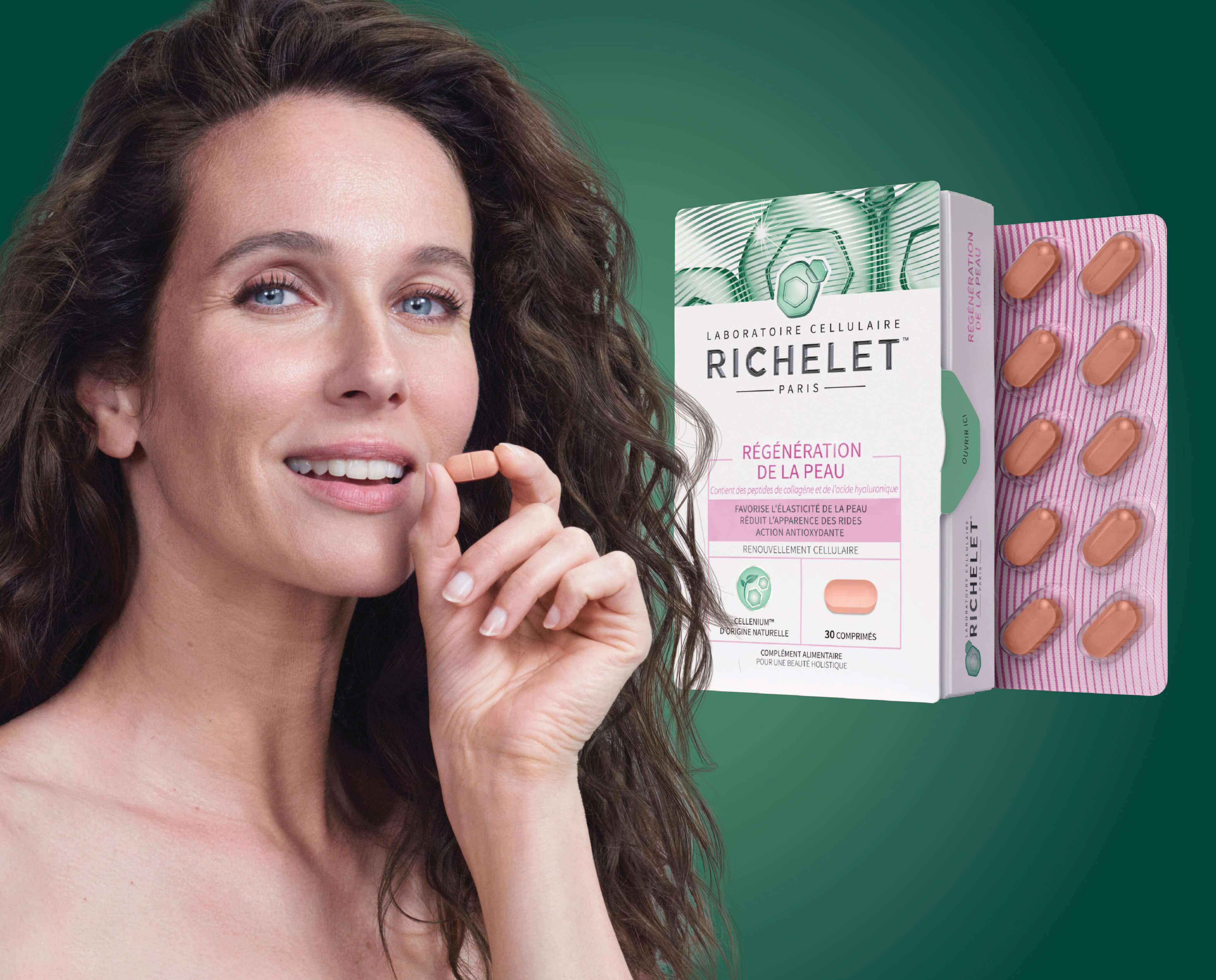 A woman holding a RICHELET® Skin Renewal capsule between her thumb and forefinger