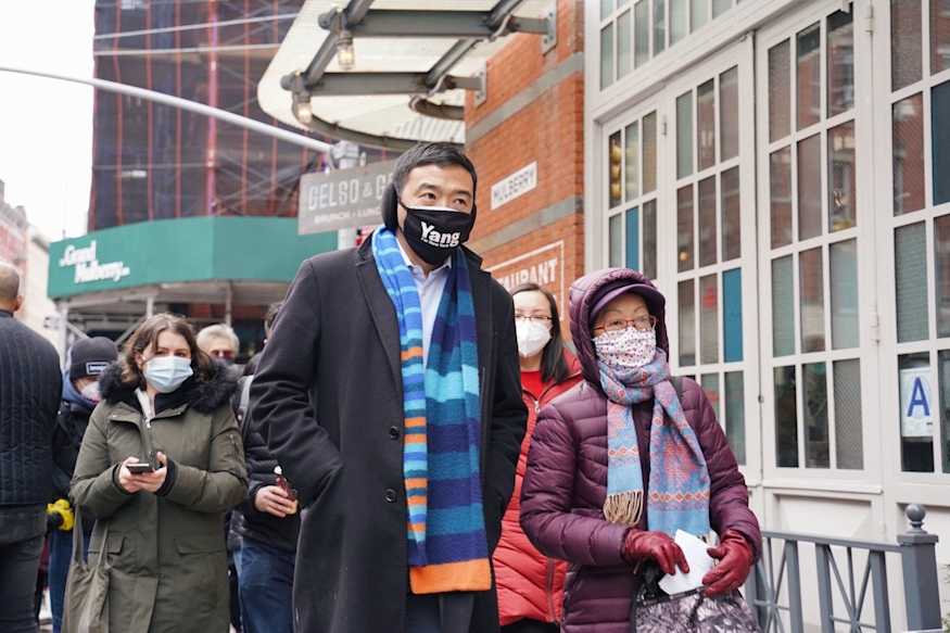 Andrew Yang walks with Council Member Margaret Chin and candidate for NYC Council District 1, Gigi Li through Lower Manhattan