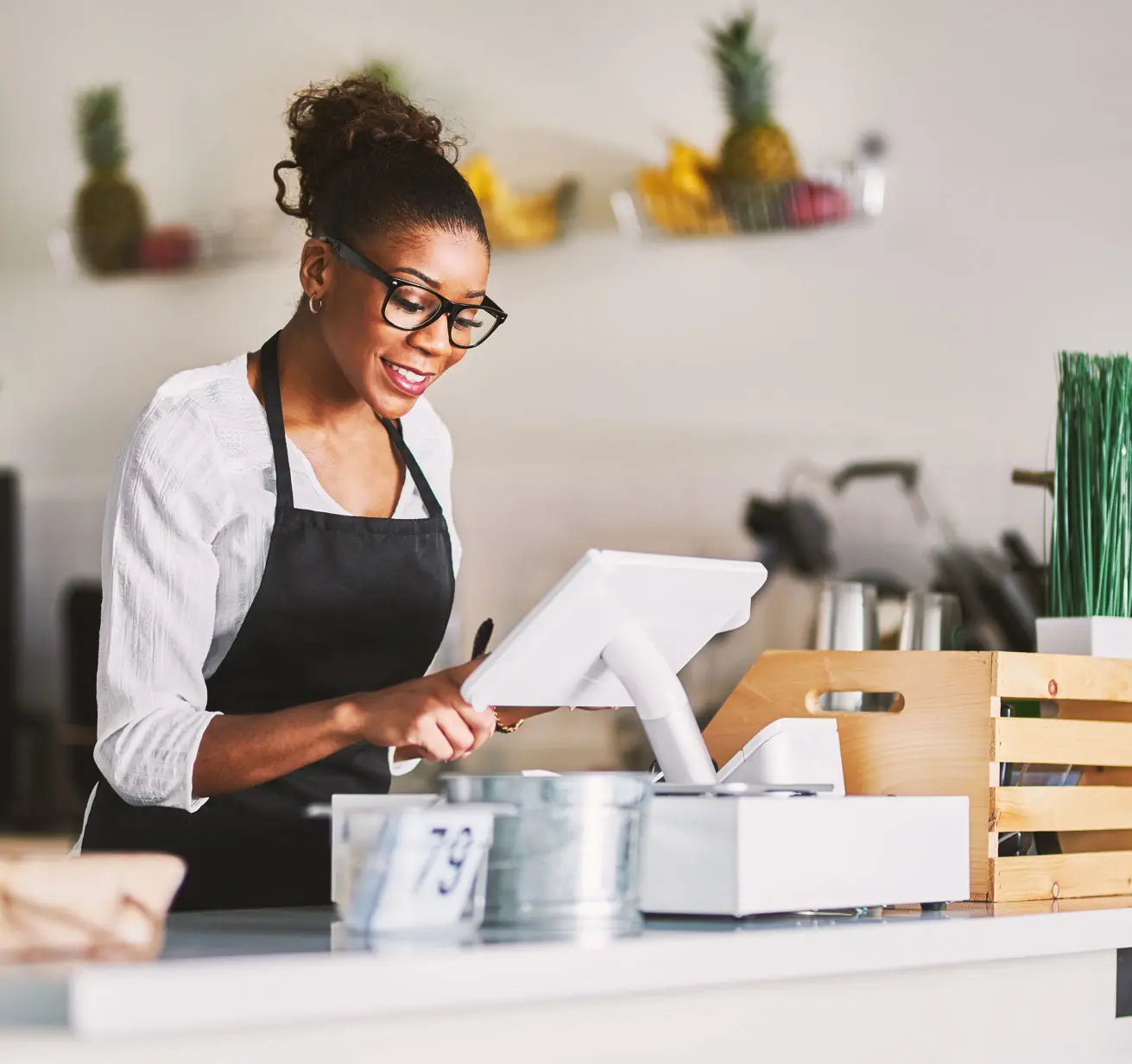 Woman at counter with station duo