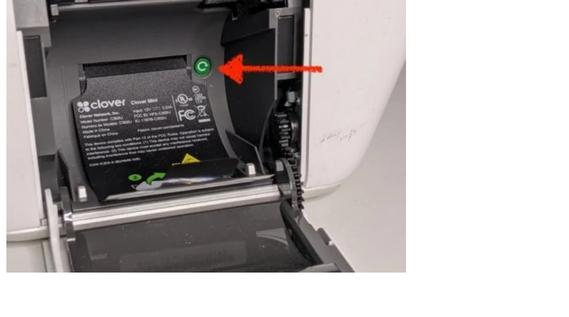 Mini device where arrow is pointing to the power button in Green.