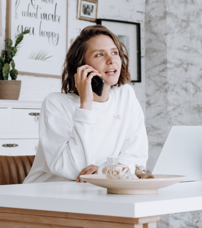 features woman on phone
