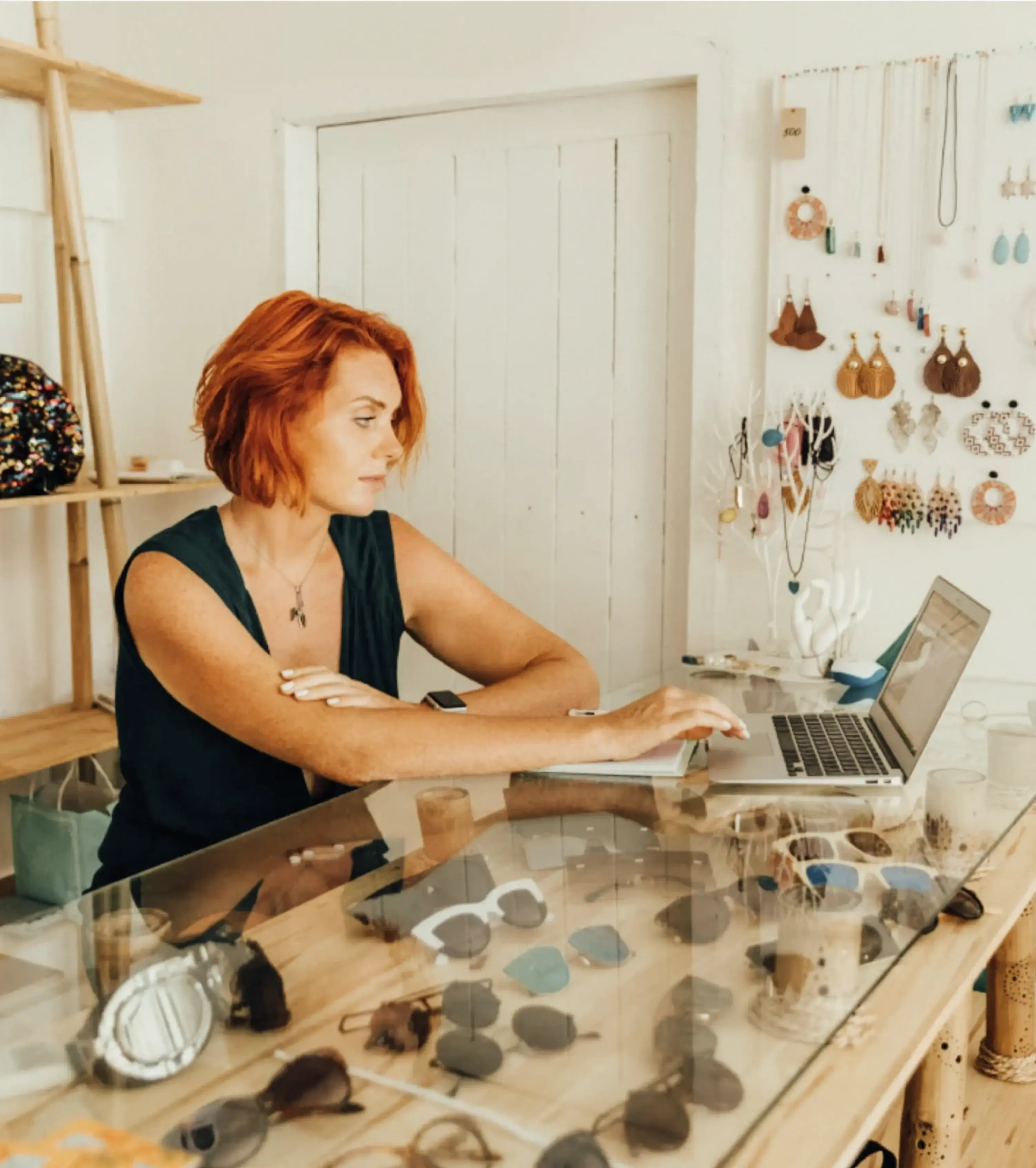 Woman at desk with laptop