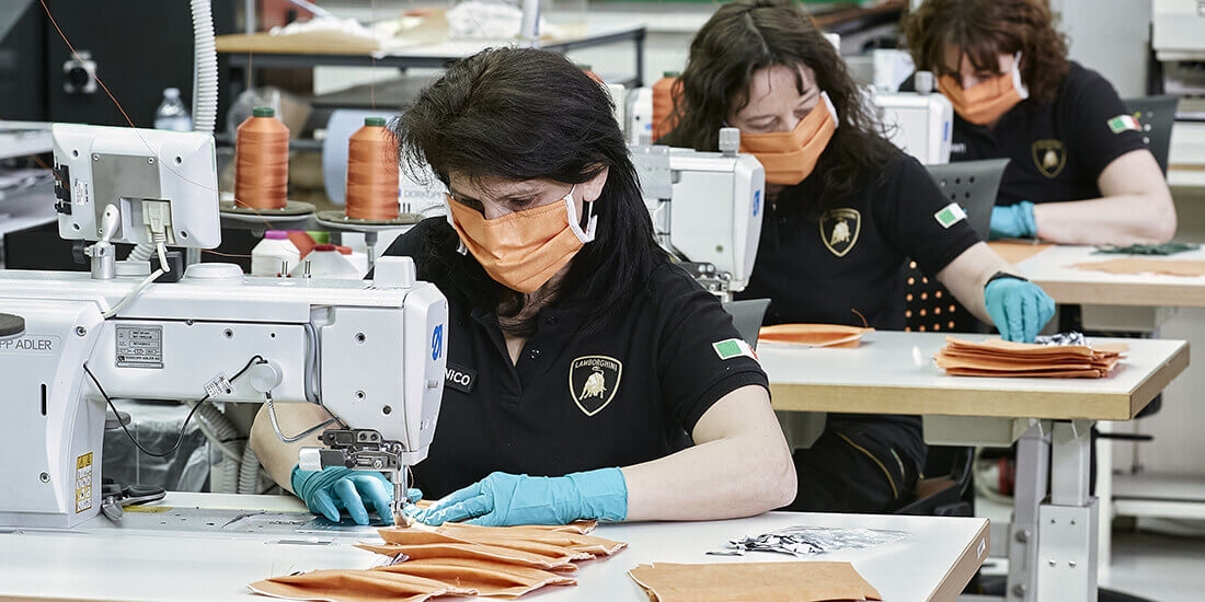 Lamborghini factory upholsterers sewing face masks