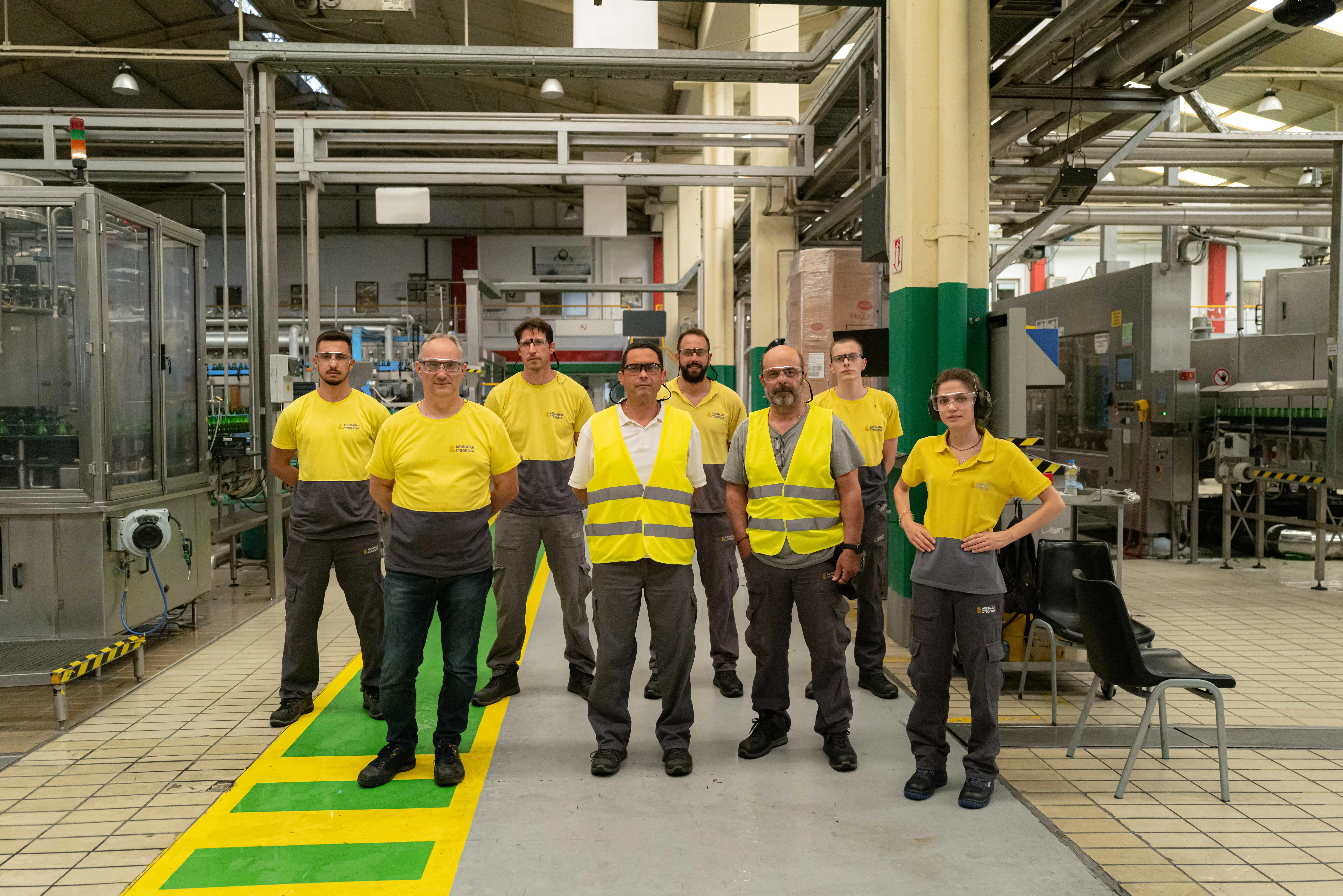 A group of brewery workers posing for a photo
