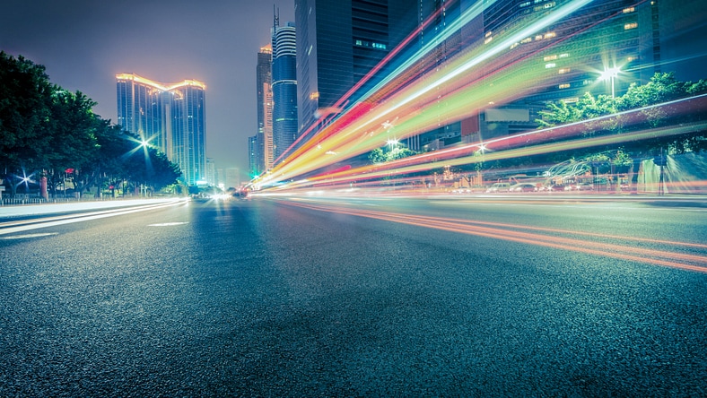 City street at night with blurred lights