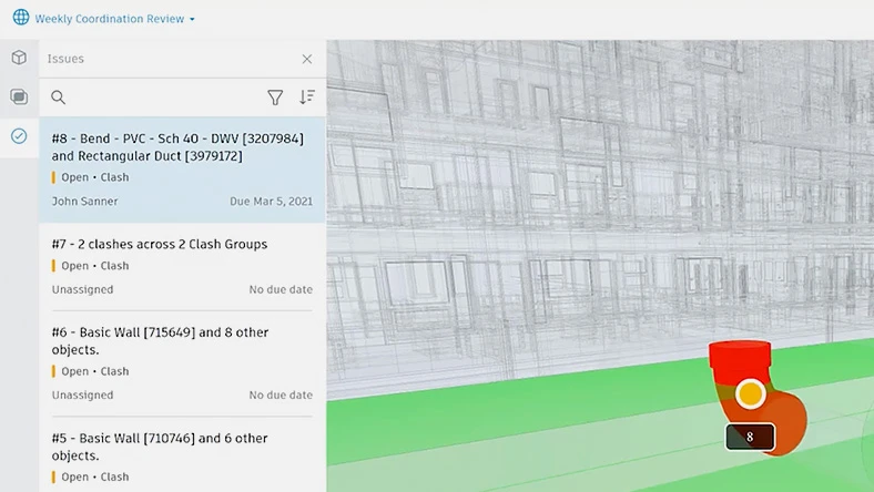 Model coordination interface showing clash issues list on the left and a highlighted clash marker in the 3D view on the right.
