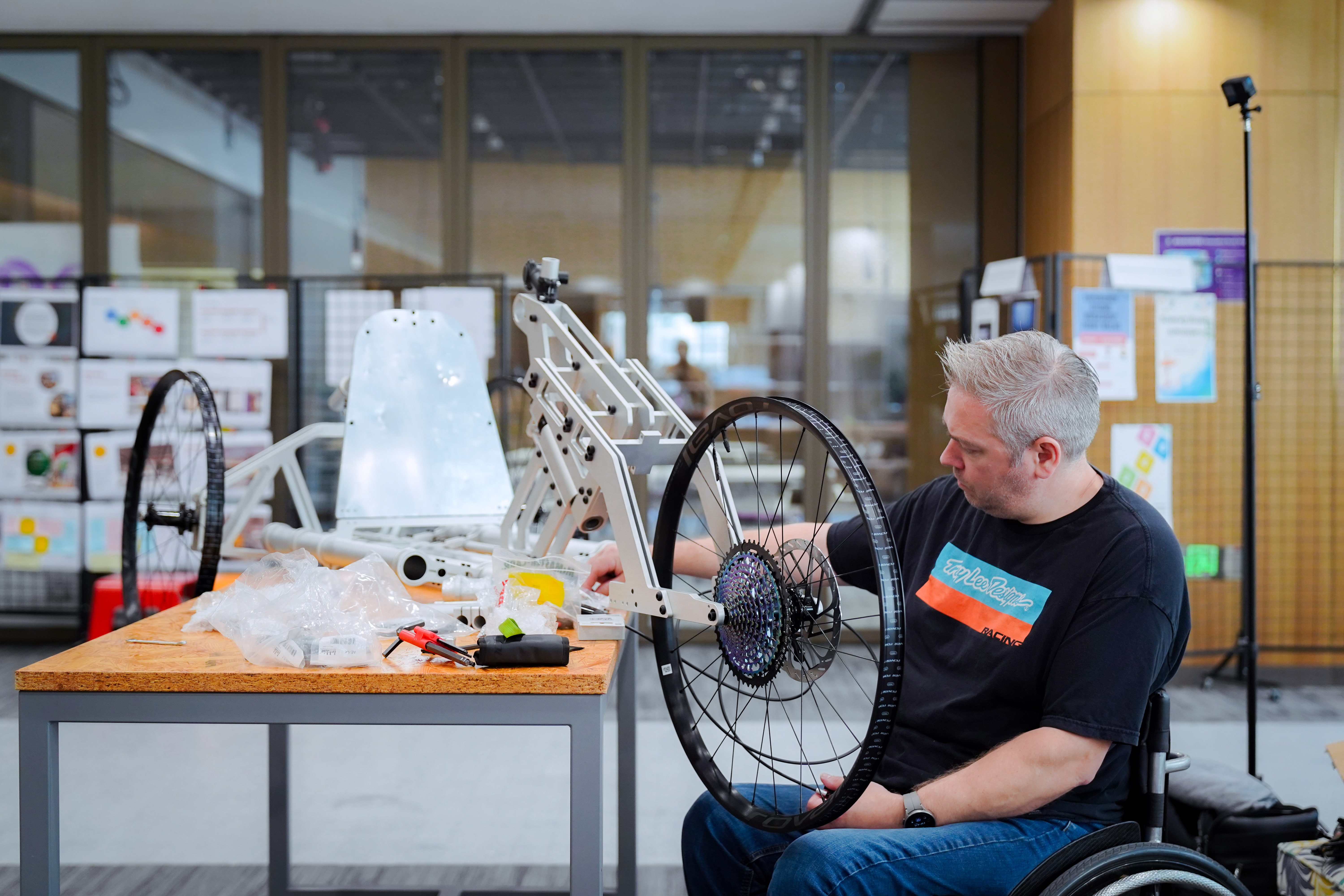 A man designing an adaptive bike
