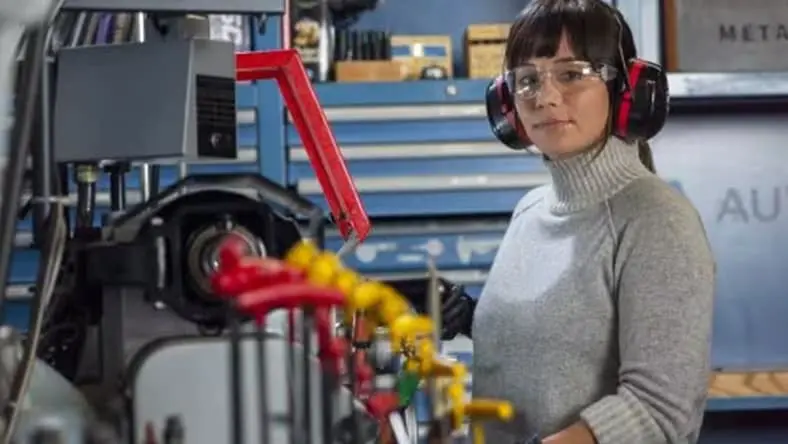 female engineer with machine