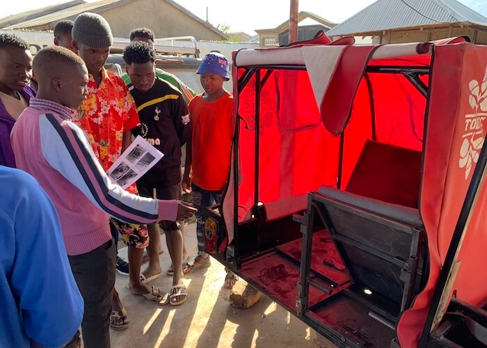 Locals in Mbeya, Tanzania provide input on the motorcycle ambulance design