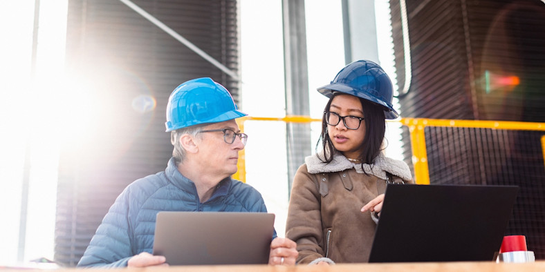 Heirloom contractors working on computers in front of direct-air-capture carbon-removal system